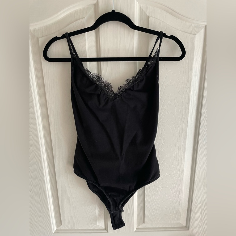Black tank top bodysuit with lace detail